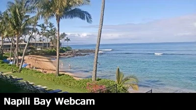 View of the beach and offshore reef as waves gently break