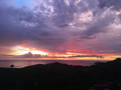 Sun goes down after a storm in Playa Flamingo Costa Rica