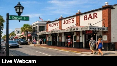Live view of Duval Street in front of the famous Sloppy Joe's Restaurant and Bar in Key West Florida.