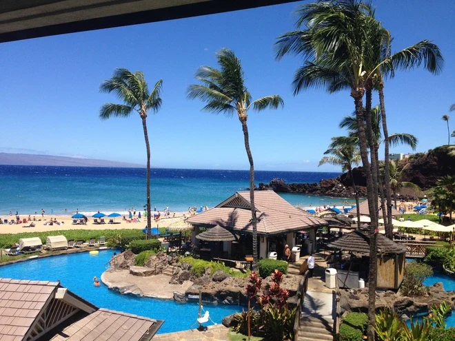 View of the Sheraton Maui Resort and Spa pool area with Black Rock in the background
