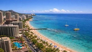 View from the very top of the Hilton Waikiki looking down at the beach and ocean.