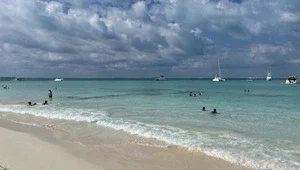 Beautiful view of the white sand and turquoise Caribbean in Isla Mujeres Mexico