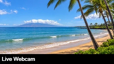 Live view of the surf and golden sand beach in Makena Maui.