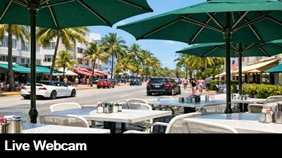 Live view of the outdoor seating area at the News Cafe from the Ocean Drive webcam in Miami Florida.