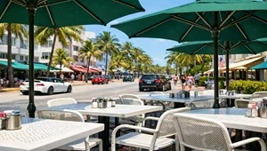 Live view of the outdoor seating area at the News Cafe from the Ocean Drive webcam in Miami Florida.