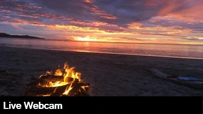 Beautiful orange and yellow sunset over Costa Rica's Playa Flamingo.