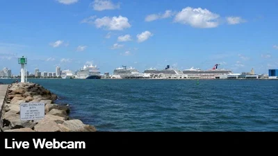 Live view of the harbor with the cruise ship port in the background.