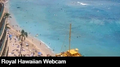 Live view from the top of the Royal Hawaiian Waikiki looking down at famous Waikiki beach and the beautiful ocean.