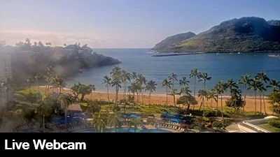 Live view overlooking the Royal Sonesta Resort pool with the ocean in the background