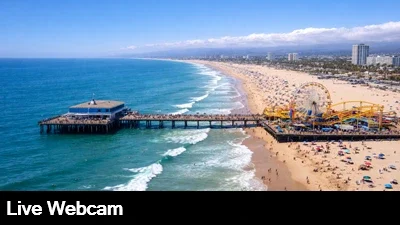 Live view of the beach, pier, amusement park and Pacific Ocean from the Santa Monica Beach webcam.