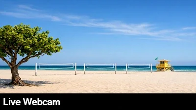 Beautiful live view of the beach, volleyball courts and ocean. This is the perfect sunset webcam.