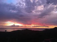 Sun goes down after a storm in Playa Flamingo Costa Rica
